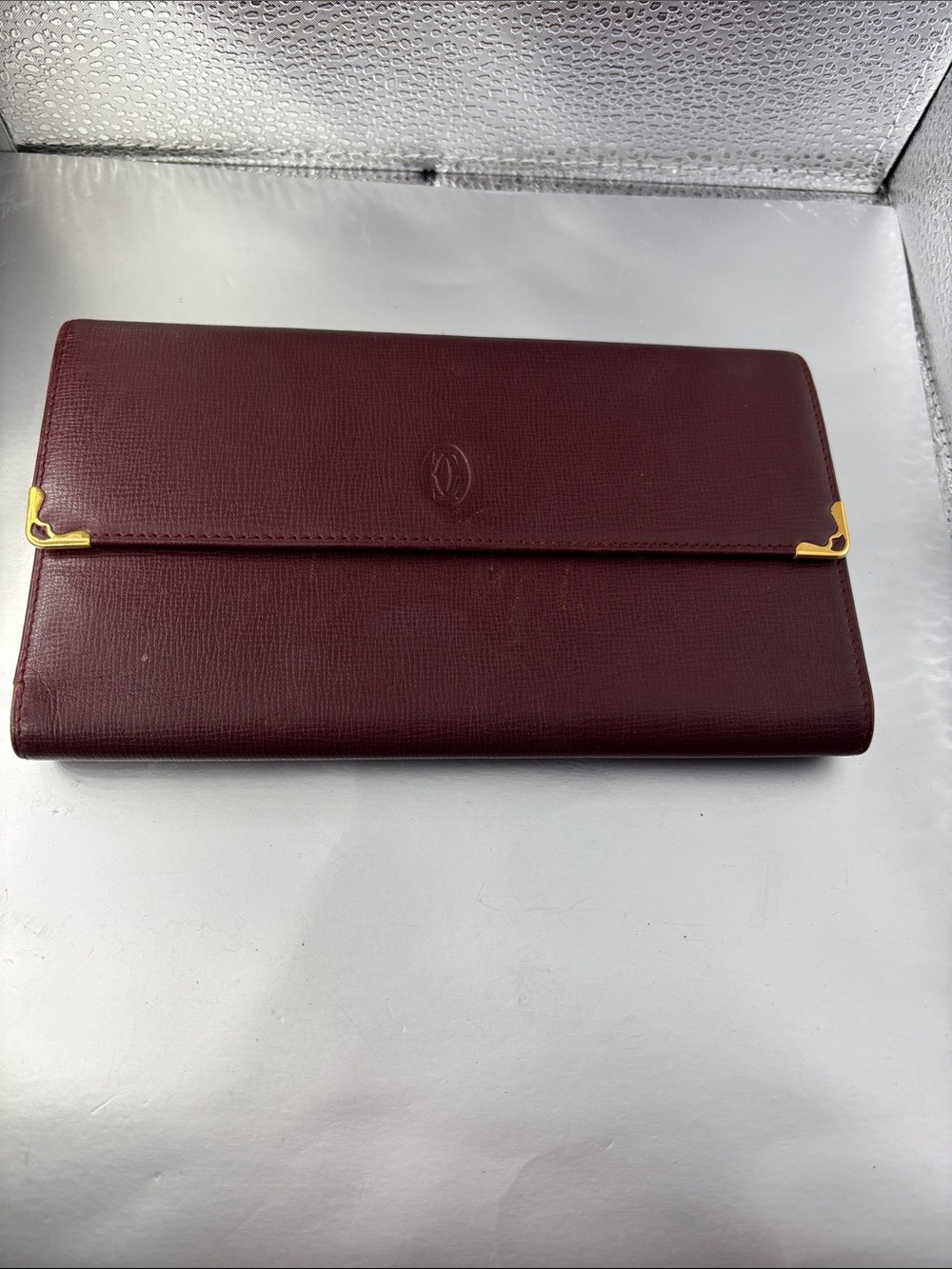 Pre-owned Authentic Cartier Burgundy Leather Fold-Over Clutch with Gold Corners